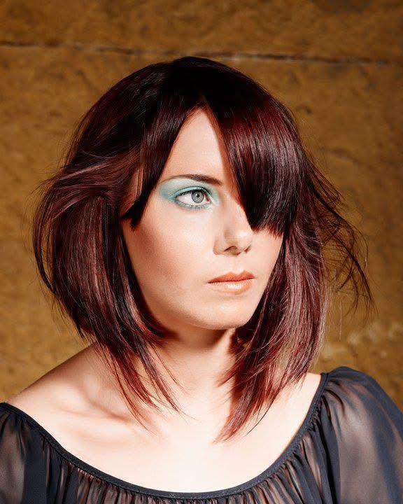 Rich cherry-red multi-tonal bob with precision cutting and movement — cut and colour by Bernd Rossmanith-Shoulder
